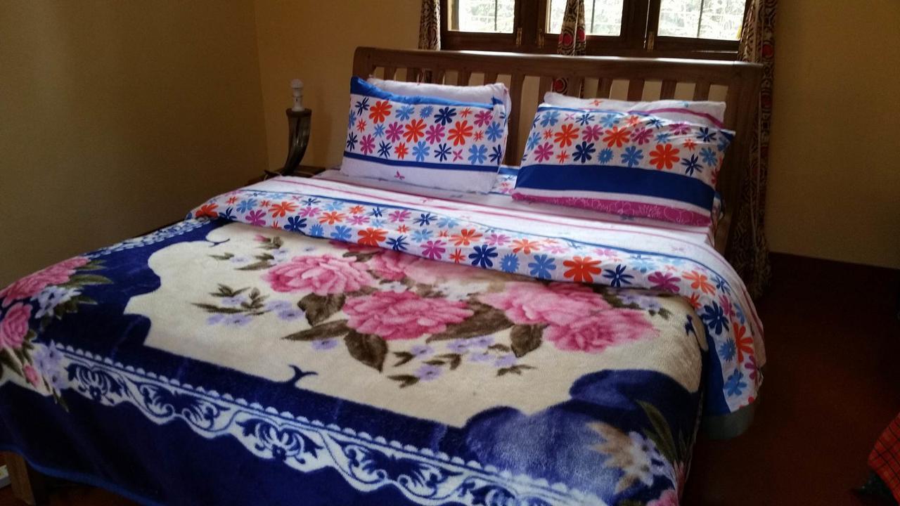 Mama Simba Bed And Breakfast Moshi Bagian luar foto